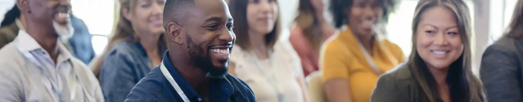 person in conference audience